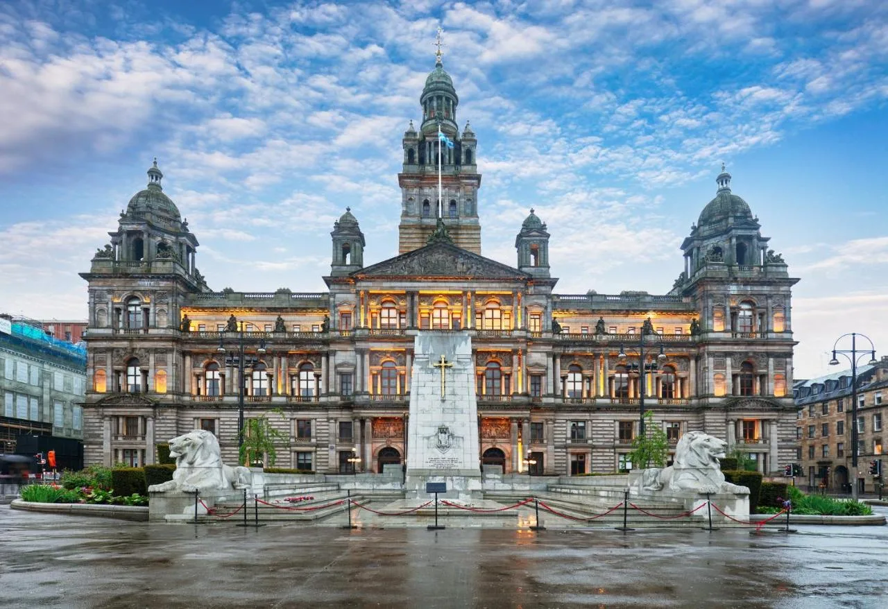 a large building with a fountain in front of it at Holiday Inn Express Glasgow City Theatreland by IHG in Glasgow